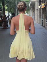 Load and play video in Gallery viewer, Chic Light Yellow Halter Homecoming Dress with Deep V-Neck and Flowy Skirt